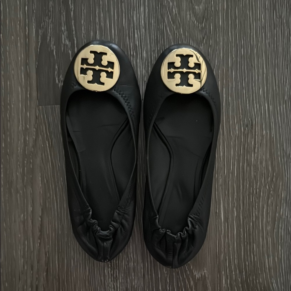 Tory Burch Black Flats with Gold Logo Medallion